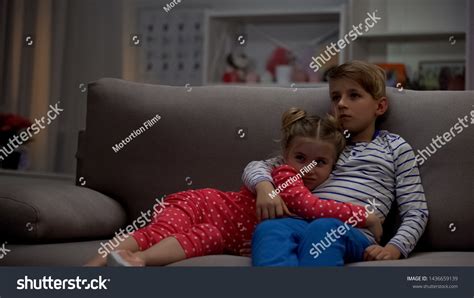 Brother Embracing Girl Watching Horror Movie Foto Stok 1436659139 Shutterstock