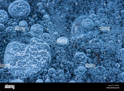 Frozen Air Bubbles In Blue Ice Stock Photo Alamy