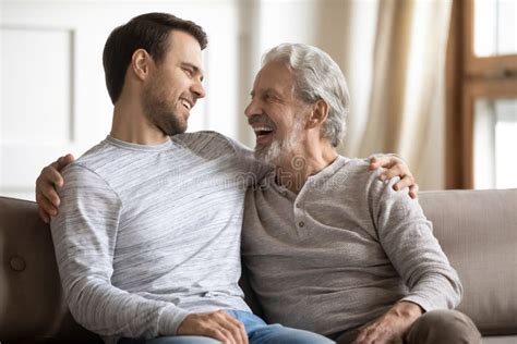 happy mature father hug adult son showing love stock image image of mature embrace 207053095