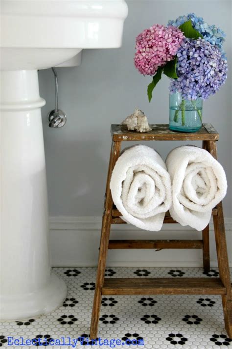 This is a great way to store extra towels. Bathroom Storage Solutions - Small Space Hacks & Tricks