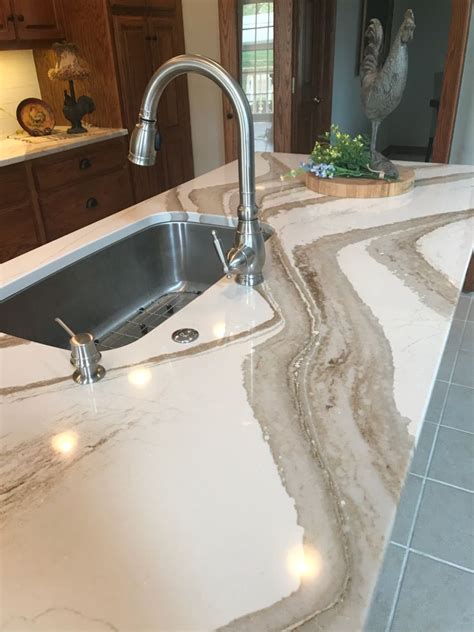 These Beautiful Cambria Quartz Countertops In Brittanicca Gold Go