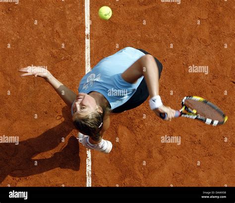 Russian Tennis Professional Nadia Petrova Serves During A Training