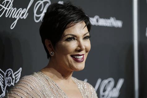 Kris Jenner Shows Cleavage In Love Magazine Advent Calendar