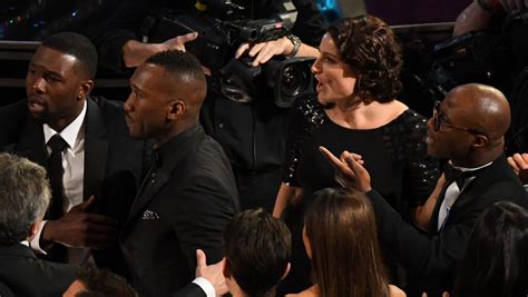 see priceless photos of the oscars audience reacting to that best picture flub