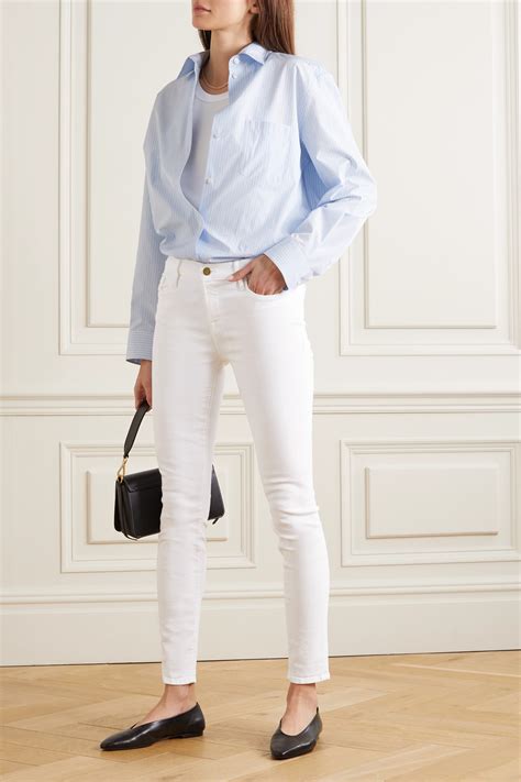 Frame Le Skinny De Jeanne High Rise Jeans In White Modesens