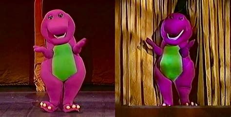 The Purple Dinosaur Is Standing In Front Of A Curtain And Pointing At