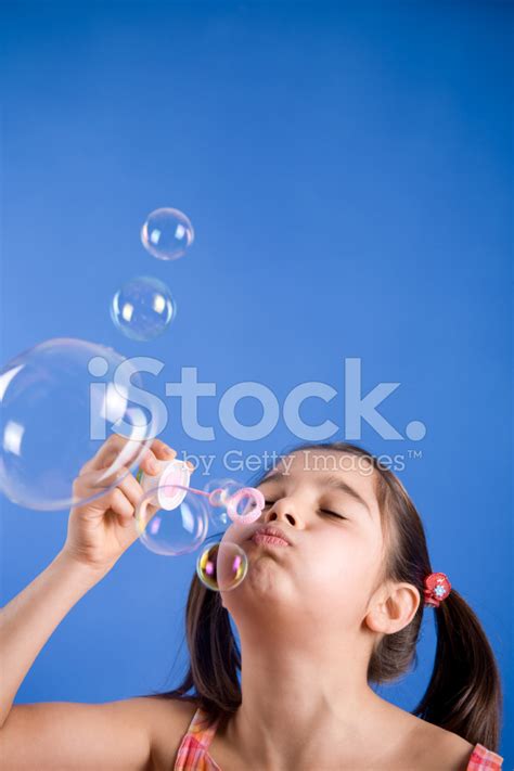 Girl Blowing Bubbles Stock Photo Royalty Free Freeimages