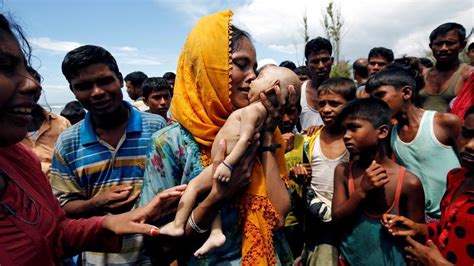 Image Shows Anguished Rohingya Woman Cradling Her Baby Who Died While