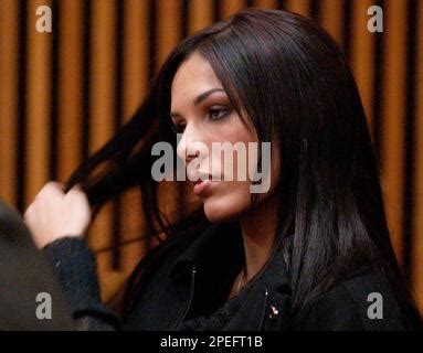 Reigning Playboy Magazine Playmate Of The Year Carmella Decesare Brushes Back Her Hair As
