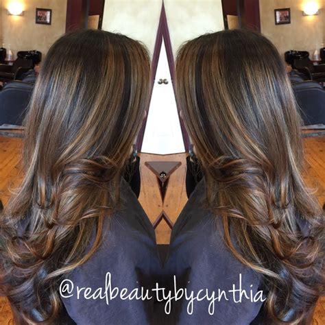 Dark brown hair with golden highlights at the hair ends, and waves are perfect for all occasions. Face framing highlights warm light caramel tone on dark ...