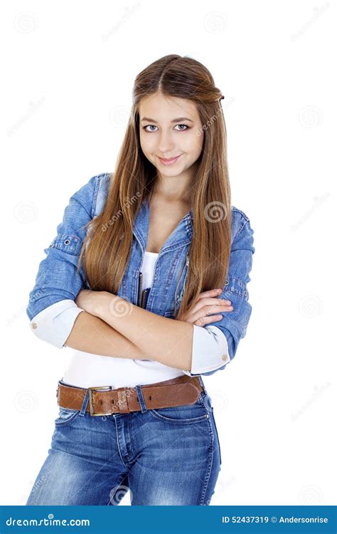 Portrait Of A Young Girl Teenager In Jeans Jacket And Blue Jeans Stock