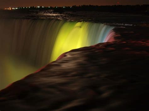 Niagara Falls Illuminated At Night Time Beautiful Places On Earth