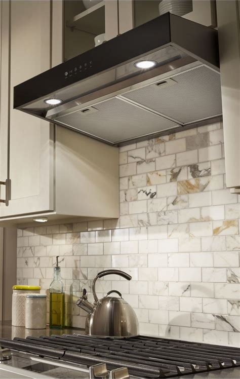 Our page top photograph illustrates a high capacity vertical rise range hood in a new york home. Kitchen Vent Hoods | Whirlpool