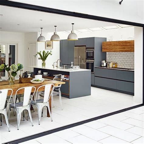 I also like the rounded kitchen area. Modern white and grey kitchen | Kitchen designs | PHOTO ...