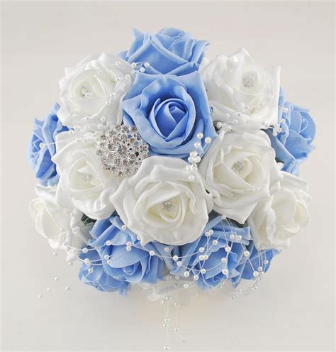 Roses dahlia and ranunculus with dusty blue and navy flower accents. Light Blue and White Diamante Foam Rose, Brooch Wedding ...
