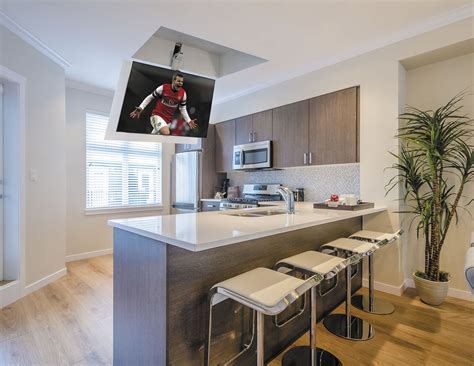 We make everything from catenary mounts, down lites, eave lites, and much more. Contemporary TV ceiling mount - FLIP 100 - Maior - remote ...