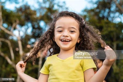Curly Hair Girl Photos And Premium High Res Pictures Getty Images