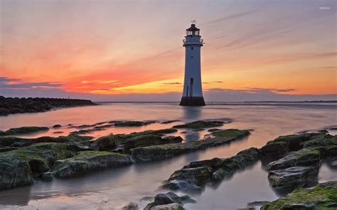 Lighthouse At Sunset Near The Mossy Coast Wallpaper Beach Wallpapers