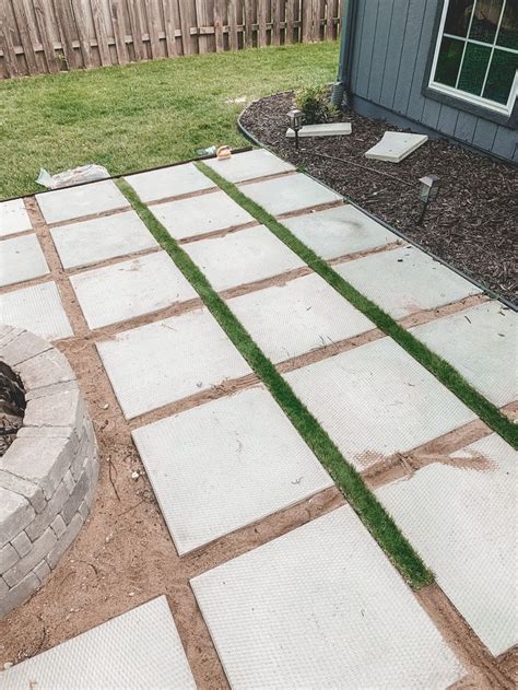 DIY Patio With Grass Between Pavers And A Fire Pit Diy Patio Pavers