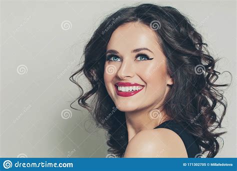 Cheerful Brunette Woman With Curly Hairstyle Smiling On White Background Stock Image Image Of