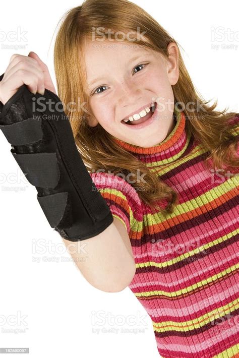 Girl Smiles And Shows Wrist Brace Stock Photo Download Image Now