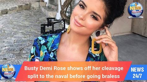 today s world busty demi rose shows off her cleavage split to the naval before going braless