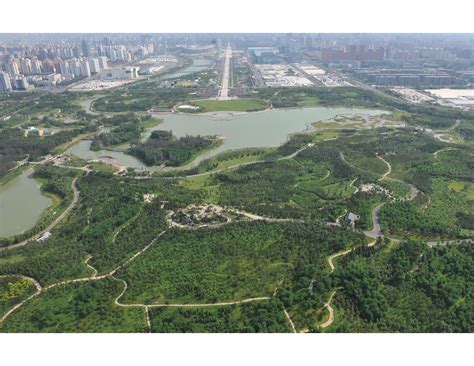 The first train —— the last train —— Beijing Olympic Forest Park, Beijing, China . A view over ...
