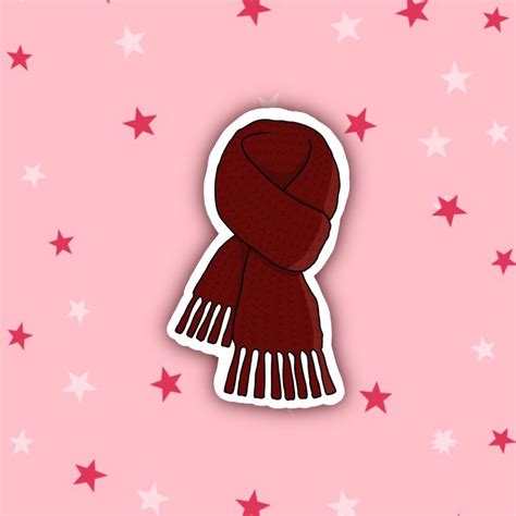 A Red Scarf And Stars On A Pink Background