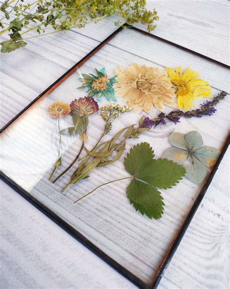 Sep 12, 2009 · the 3rd picture (in the first set at the top) looks as if the frames are all different, but if you look carefully they all have gold, wheather the frame color or trim, and that makes them cohesive. Pin on pressed flower art