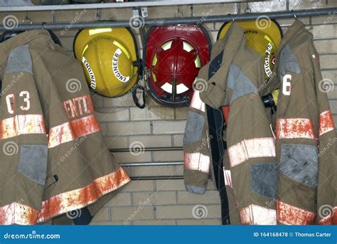 Firefighters Gear And Helmets Hanging Up Editorial Stock Photo Image