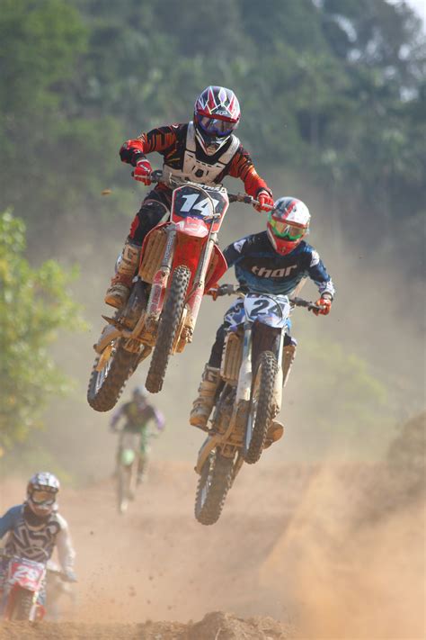 Two People Riding On Dirt Bike · Free Stock Photo