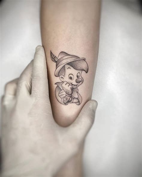 Pinocchio Tattoo Done On The Inner Forearm