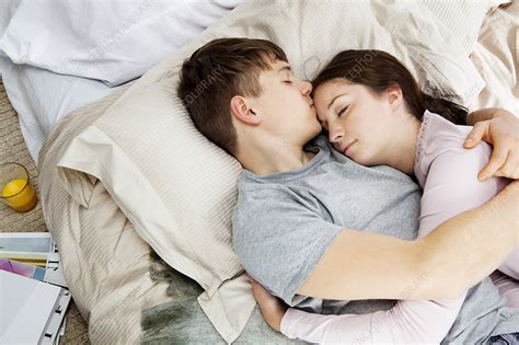 Couple Embracing Laying In Bed Stock Image F0036895 Science