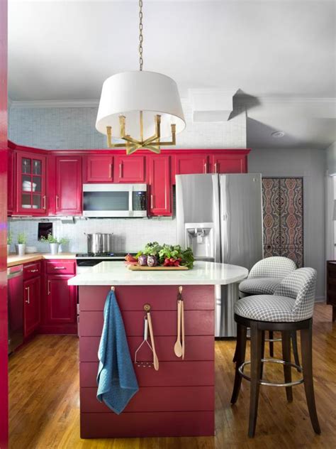 The wall that carves out the breakfast nook is a paint shade called soft sky by benjamin moore. Colorful Painted Kitchen Cabinet Ideas | HGTV's Decorating & Design Blog | HGTV