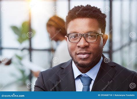 Head Shot Of Confident Young Handsome Black Man Looking At Camera
