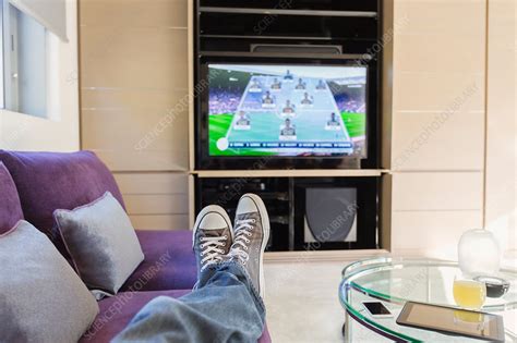 Man With Feet Up Watching Tv Stock Image F0171642 Science Photo Library