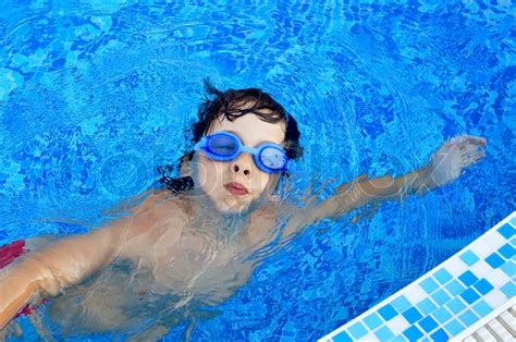 Little Boy Swimming In The Pool Stock Photo Colourbox