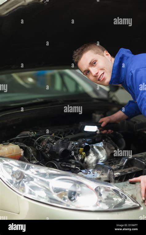 Repairman Examining Car Engine Stock Photo Alamy