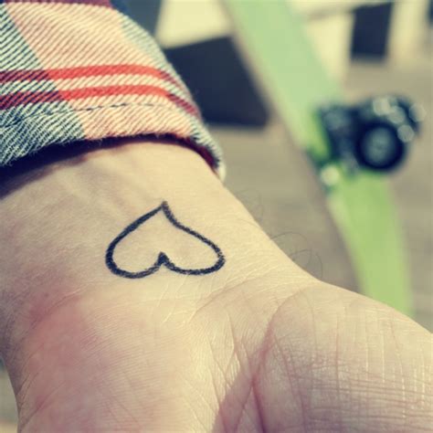 15 Love Tattoo Designs With Hidden Meanings And Symbols