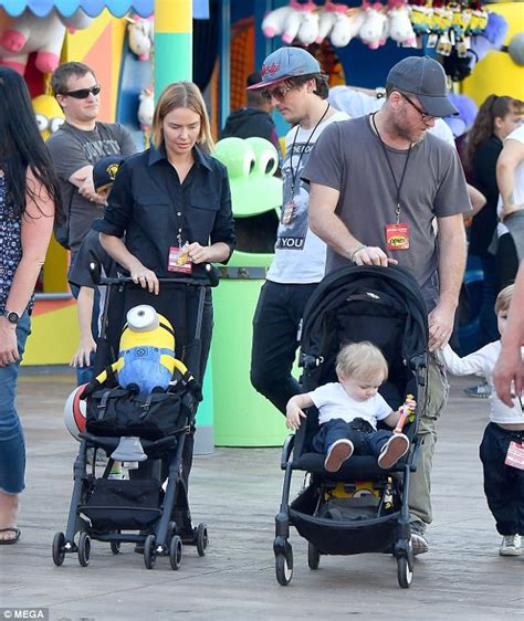 Lara bingle and sam worthington have been spotted enjoying a beach outing with their newborn baby boy and his two brothers. Lara sits in her son's pram at Universal Studios | Daily ...