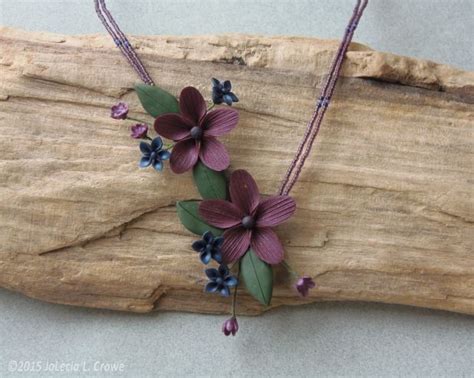 These colored sola wood flowers are great for wedding decorations, cake decorations, special occasions and diy projects. This sculpted asymmetrical floral spray combines textured ...