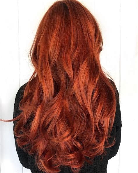 we love this long fiery auburn red fall ready hair color from distinctive salon and spa click