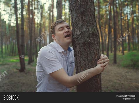 Man Hugging Tree Image And Photo Free Trial Bigstock