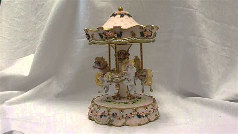 Maybe you would like to learn more about one of these? Hearts & Roses Carousel Animated Music Box - YouTube