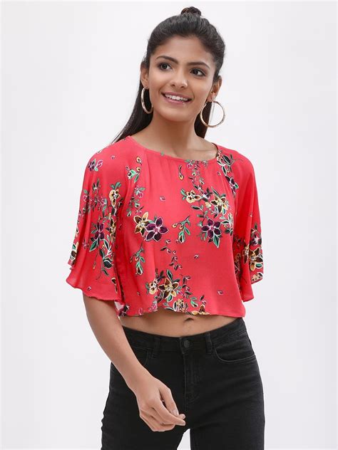 A crop top is literally a cropped top that ends just above, or at the midriff. Buy KOOVS Multi Butterfly Sleeve Printed Crop Top for ...