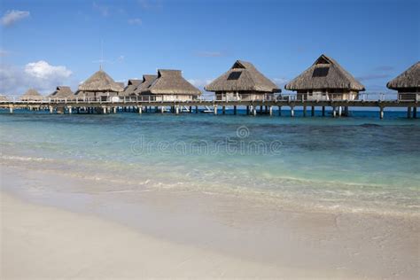 Typical Landscape Of Tropical Islands Huts Wooden Houses Over Water