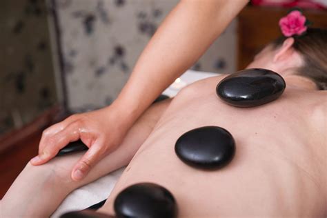 the healing power of hot stone massage at kayakama spa edmonton best spa in edmonton waxing
