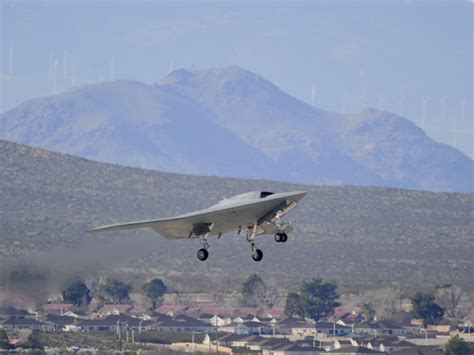 X 47b Unmanned Stealth Bombers Maiden Flight Cbs News