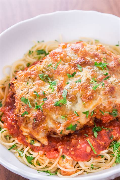 My husband prefers this recipe with angel hair pasta. Oven Baked Chicken Parmesan Over Angel Hair Pasta - BigOven