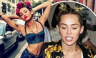 Miley Cyrus Shows Her Sultry Side As She Strikes A Pose In Tiny Top And Shorts In Twitter Picture